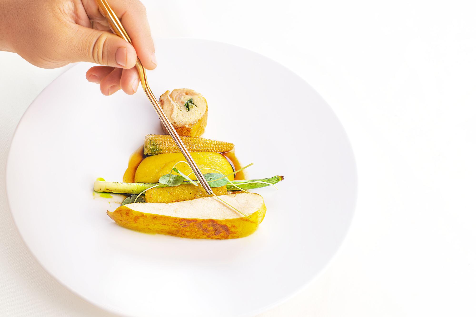 Students tasting a plated dish